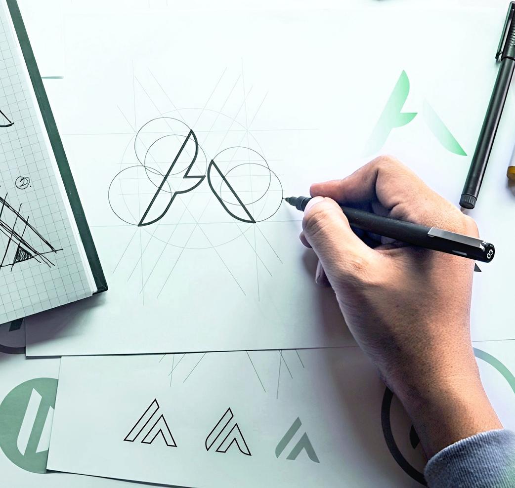 man and woman working on a desk