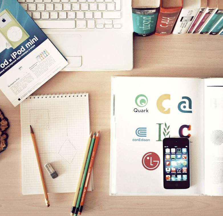 man and woman working in an office