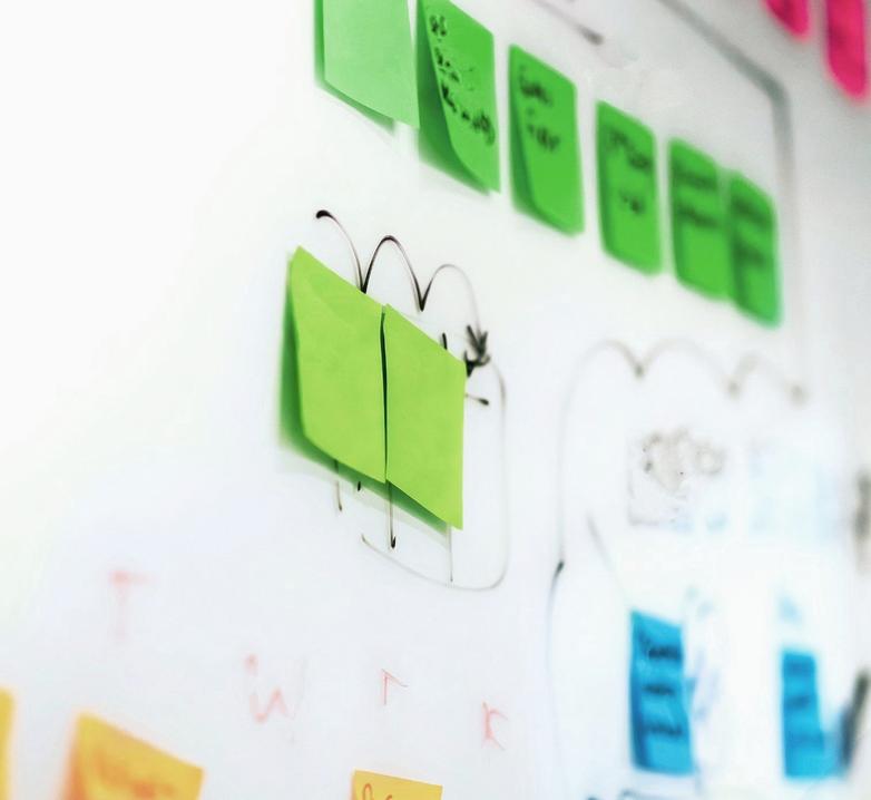 man and woman working on a desk